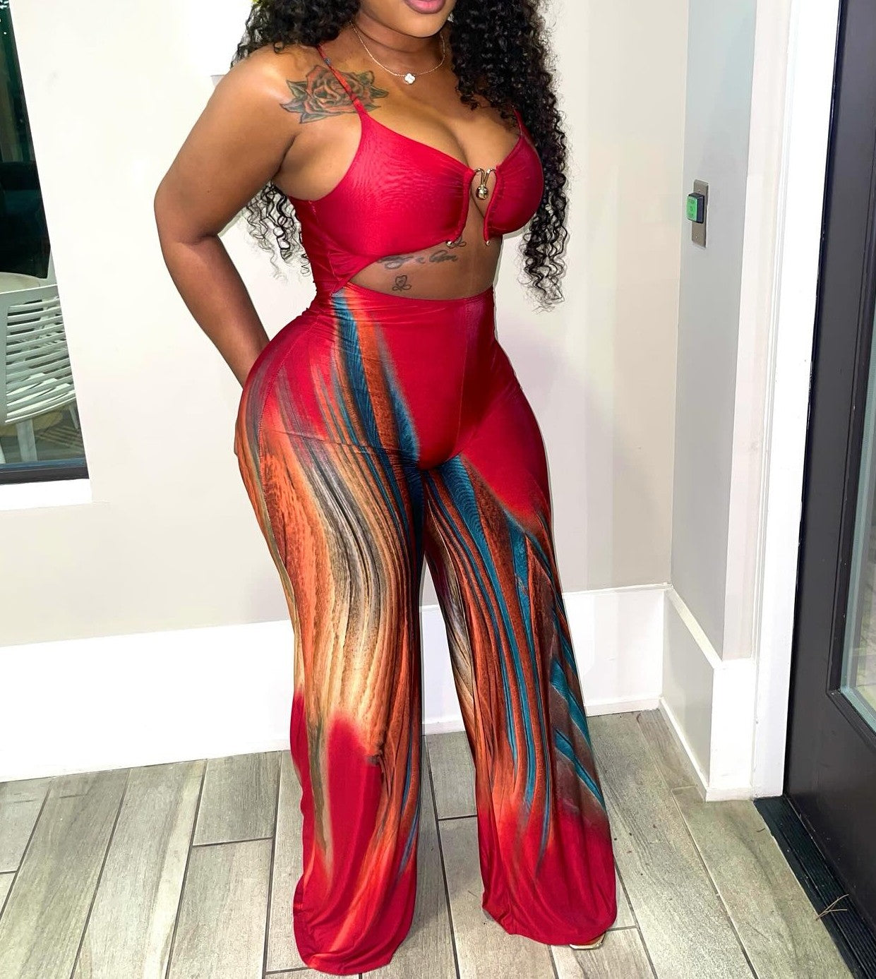 Printed suspender jumpsuit with metallic trim details