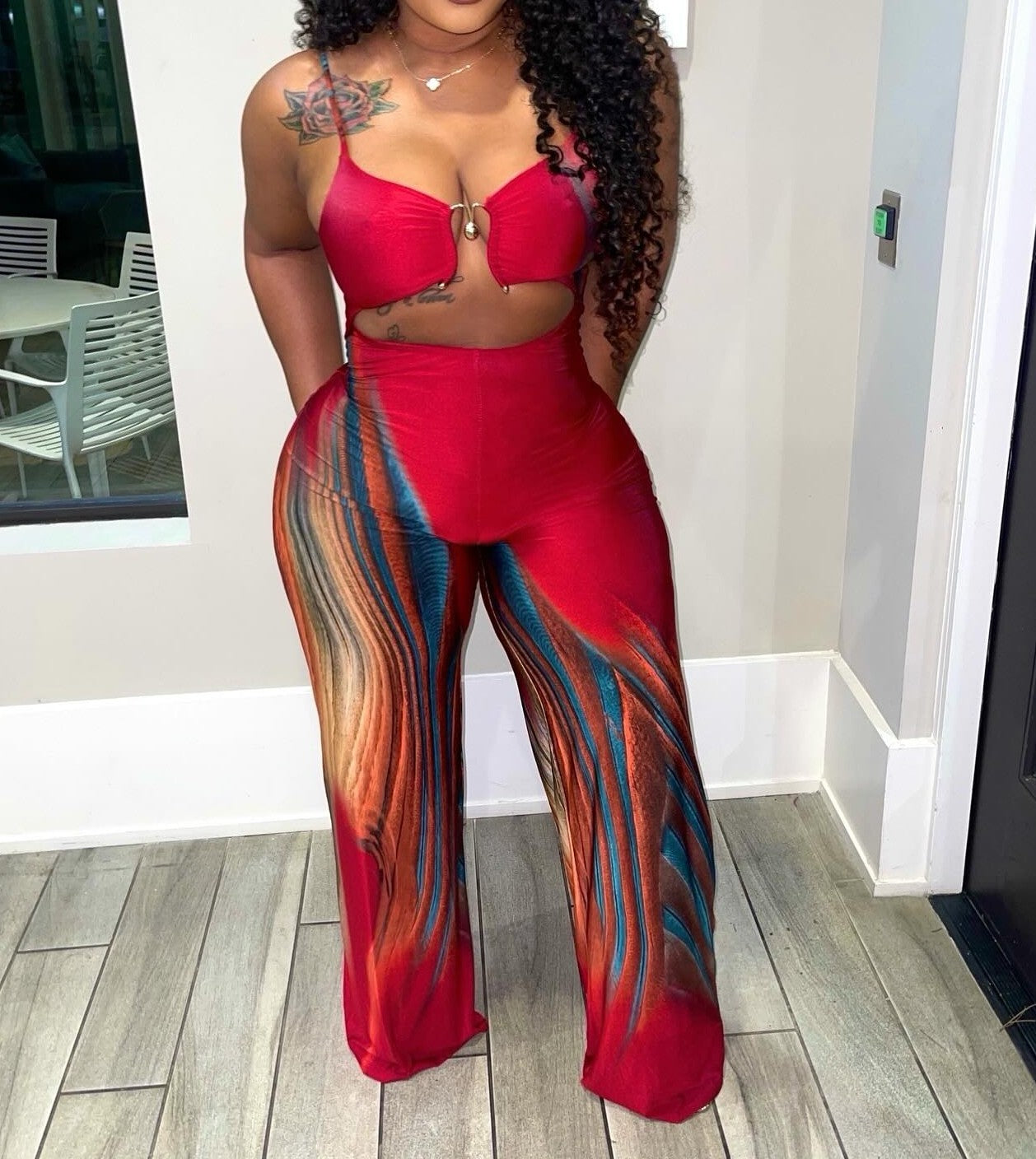 Printed suspender jumpsuit with metallic trim details
