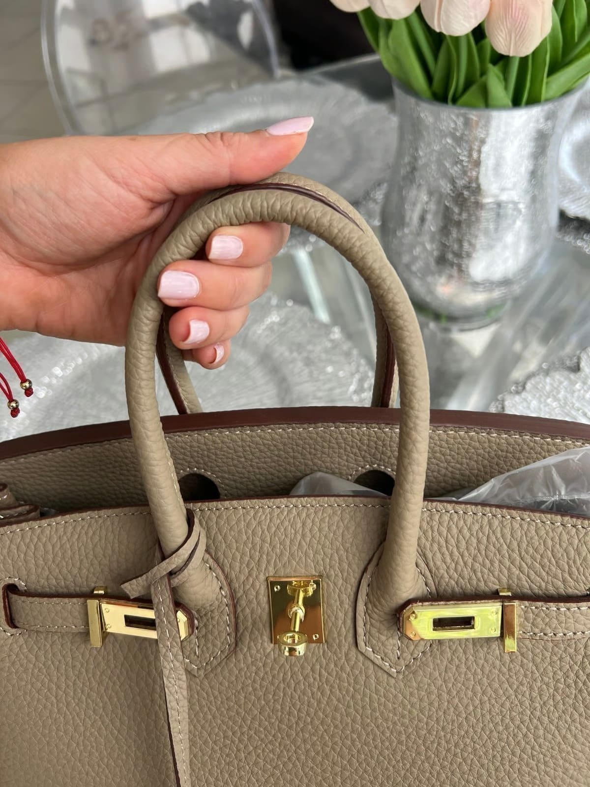 Litchi-grain leather lock bag