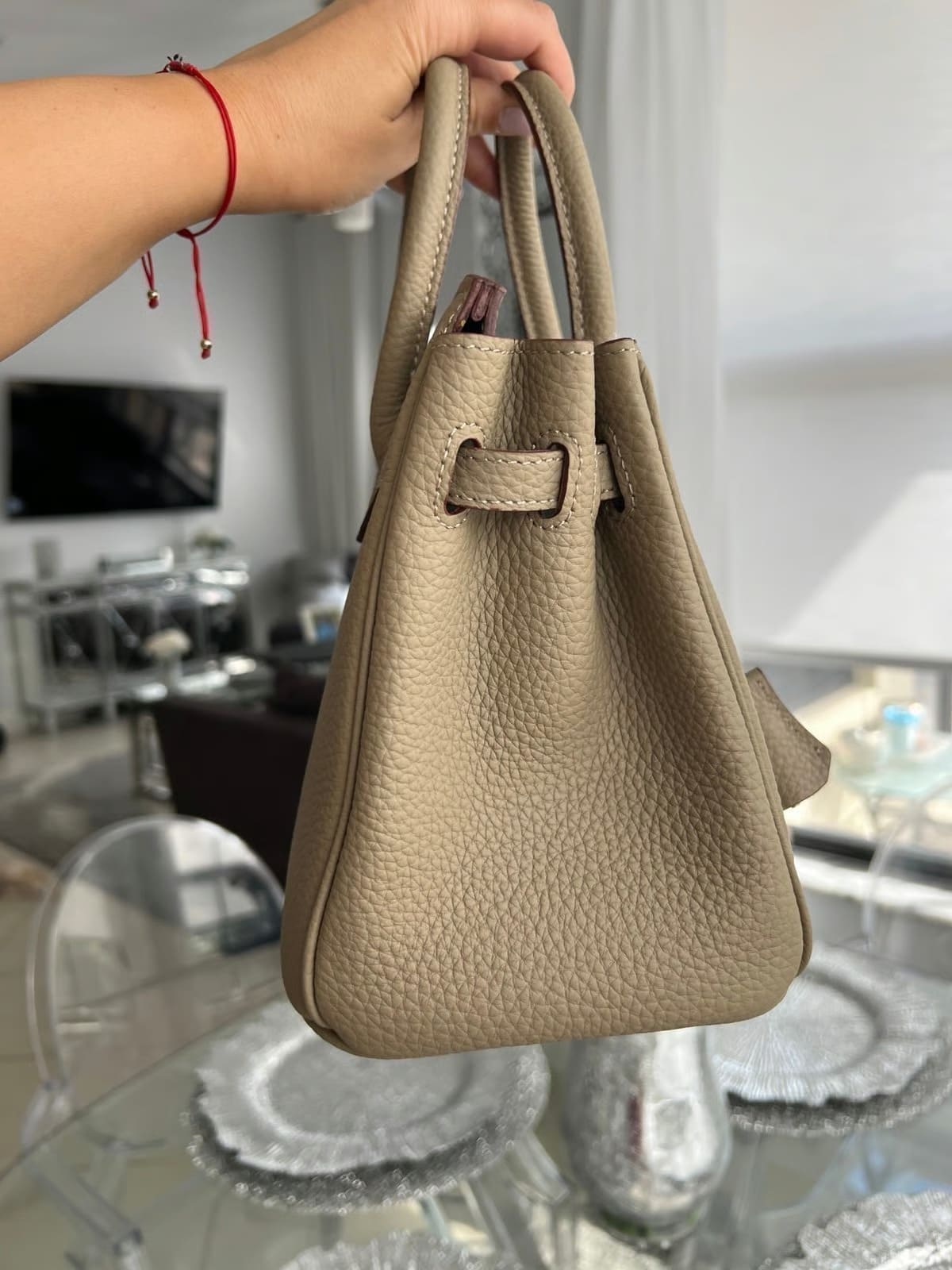 Litchi-grain leather lock bag