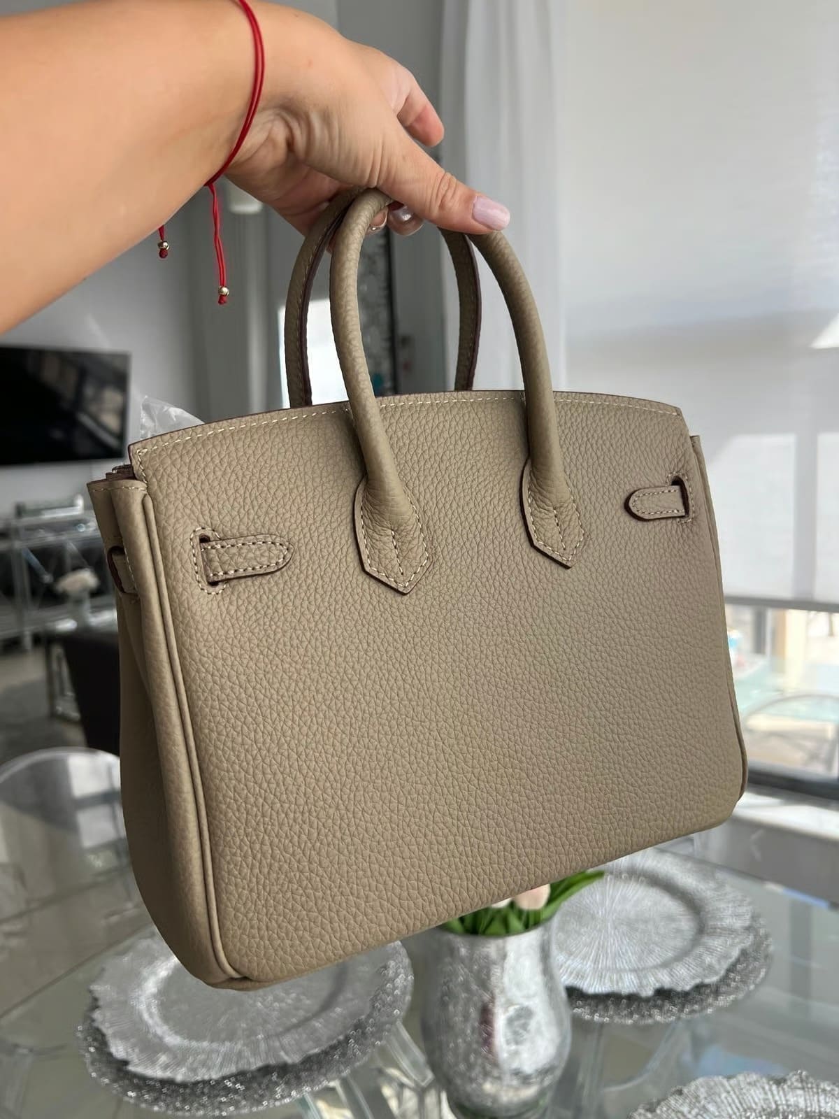 Litchi-grain leather lock bag